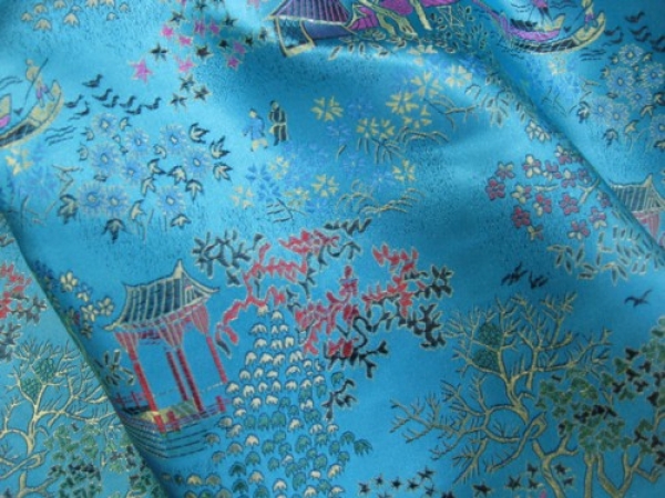 Schwerer Satin mit gewebtem Chinamuster Türkis Meterware